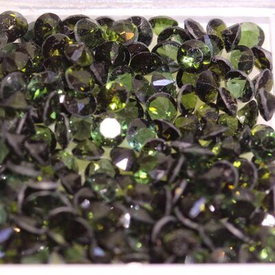 Green Tourmaline 17.38 ct will sell in 5 ct lots for $50